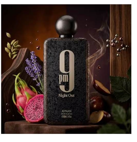 Afnan 9 PM Night Out bottle styled with flowers on a dark background