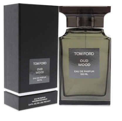 Tom Ford Oud Wood Eau de Parfum 100ml bottle beside its dark presentation box