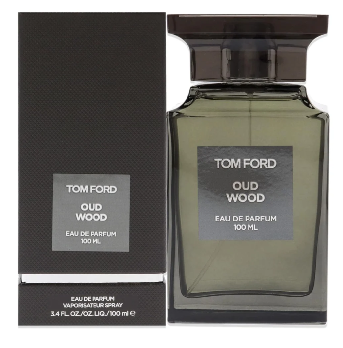 Tom Ford Oud Wood Eau de Parfum 100ml bottle beside its dark box